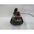 Resin table water fountain with 2 frogs on it